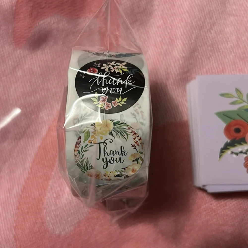 Thank you cards and thank you stickers.